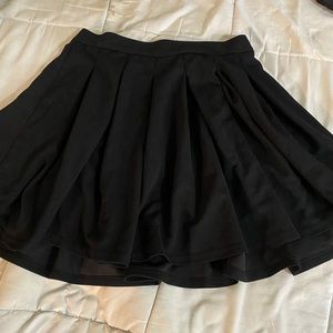 Black pleated skirt